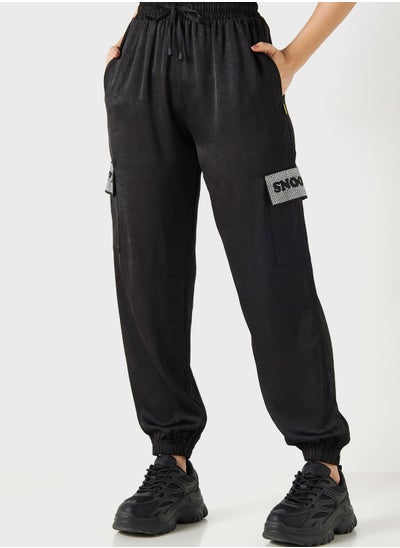 Buy Snoopy Embellished Sweatpants in UAE