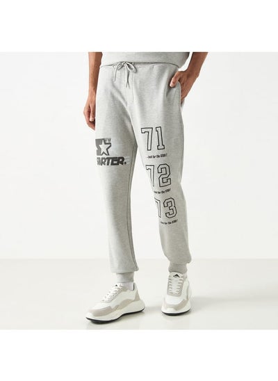 Buy Starter Logo Embossed Flexi Waist Relaxed Fit Joggers with Drawstring Closure in Saudi Arabia