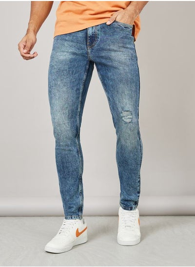 اشتري Skinny Fit Light Wash Rip and Repair Jeans في السعودية