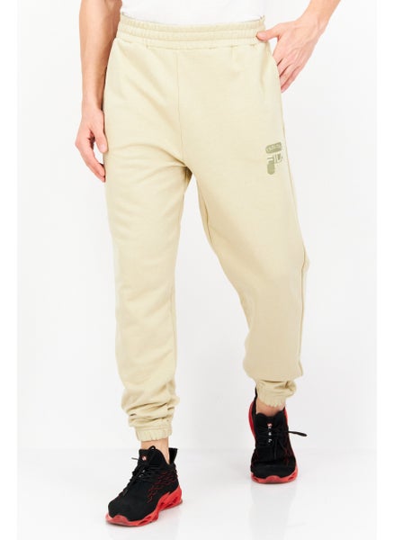 Buy Men Relaxed Fit Badra Drawstring Outdoor Sweatpants, Khaki in Saudi Arabia