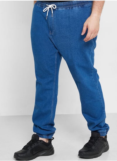 Buy Relaxed Fit Denim Joggers in Saudi Arabia