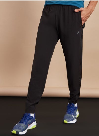 Buy Woven Running Track Pants with Zip Hem in Saudi Arabia