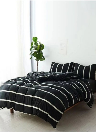 Buy Duvet cover set, black and white stripe design. in UAE