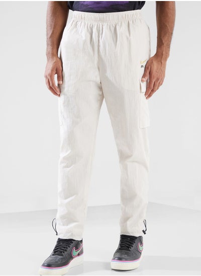 اشتري Nsw Air Lightweight Woven Pants في الامارات