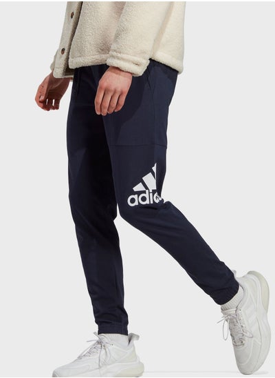 Buy Essential Logo Tapered Sweatpants in UAE