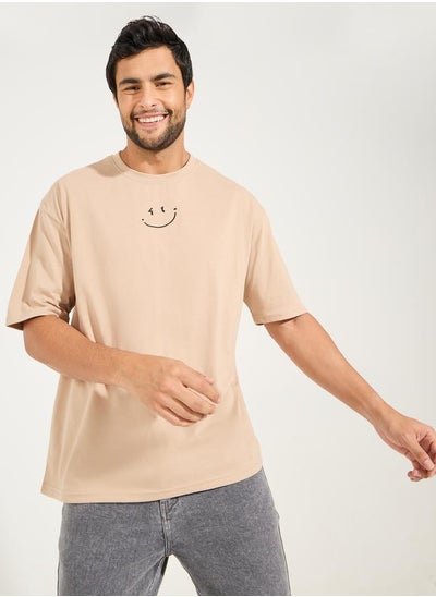 Buy Minimal Emoji Chest Print Oversized T-Shirt in Saudi Arabia