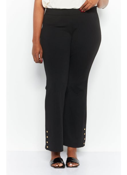 Buy Women Plus Size Solid Flare Pants, Black in UAE