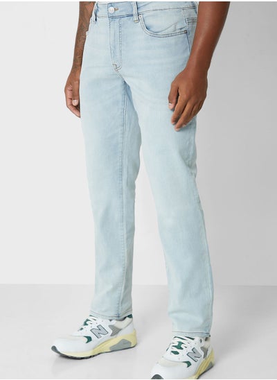 Buy Slim Fit Mid Wash Jeans in UAE