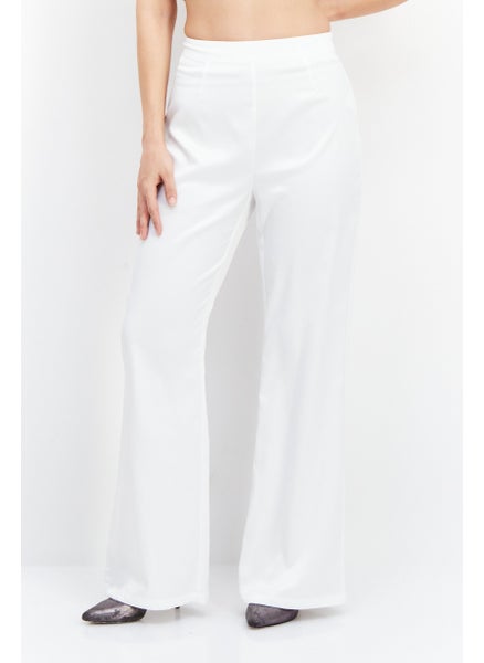 Buy Women Plain Flare Pants, White in UAE