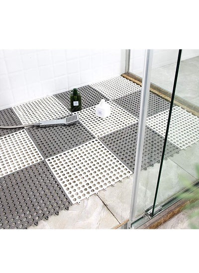 اشتري 12 Non Slip Interlocking Drainage Floor Tiles Soft PVC Bath Mat for Bathroom Kitchen Pool 11.8x11.8 Inch في الامارات