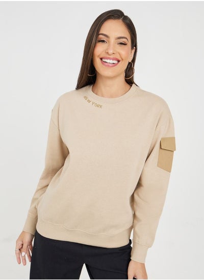 Buy Regular Fit Slogan Sweatshirt with Pocket Detail in Saudi Arabia