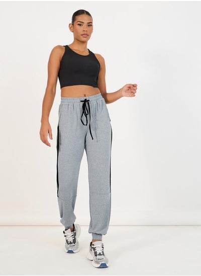 Buy Melange Contrast Drawstring & Side Stripe Joggers in Saudi Arabia