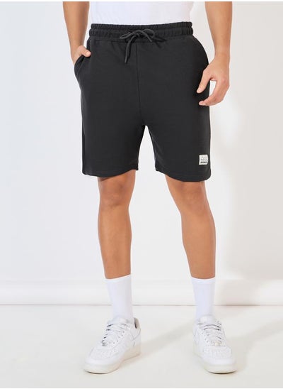 Buy Badge Detail Regular Fit Terry Shorts in Saudi Arabia