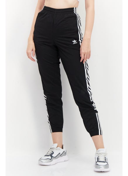 Buy Women Sportswear Fit Brand Logo Track Pants, Black in UAE