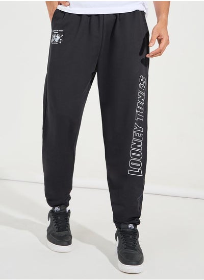 Buy Looney Tunes Character Print Pocket Detail Oversized Joggers in Saudi Arabia