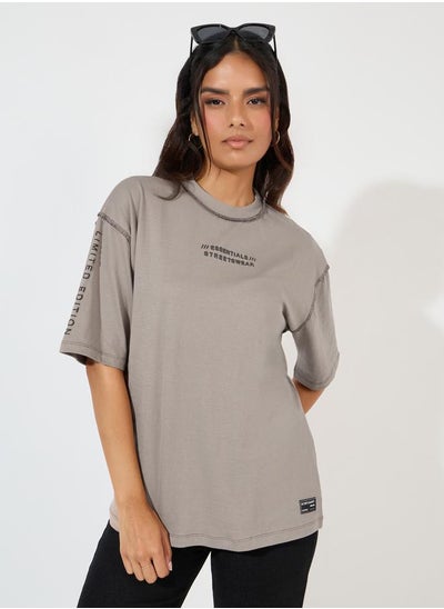 Buy Oversized Overlock Seam Detail Printed T-Shirt in Saudi Arabia