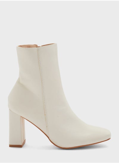 Buy Rounded Toe Block Heel Boot Cream in UAE