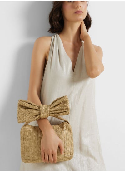 Buy Raffia Bow Clutch Bag in Saudi Arabia