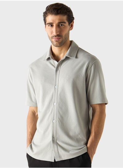 اشتري Textured Regular Fit Shirt في الامارات