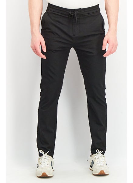 Buy Men Drawstring Solid Pants, Black in UAE