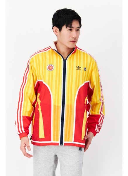 Buy Men Sportswear Fit Outdoor Reversible Track Jacket, Yellow/Red in UAE