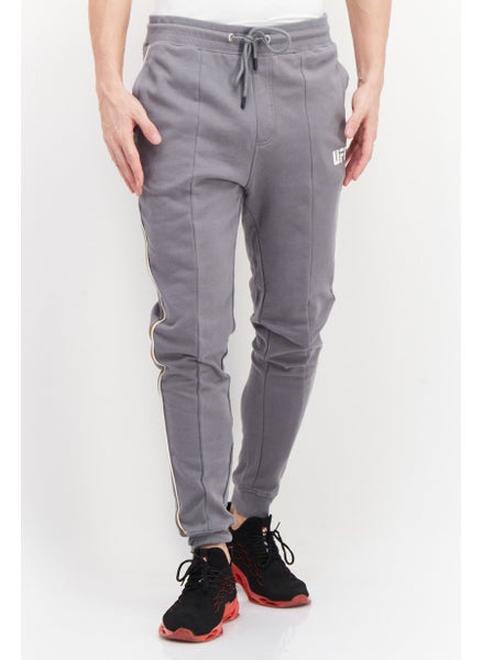 اشتري Men Sportswear Fit Brand Logo Training Jogger Pant, Grey في الامارات