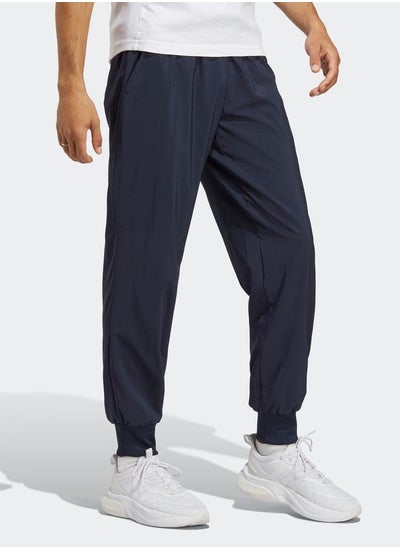 Buy Aeroready Essentials Stanford Tapered Cuff Embroidered Small Logo Pants in Saudi Arabia