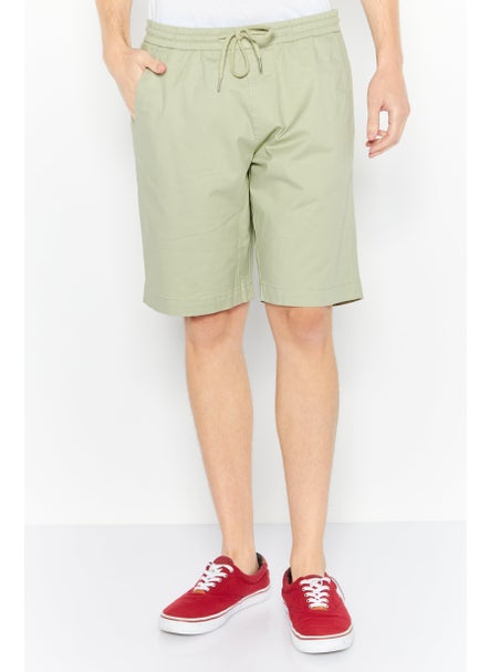 Buy Men Relaxed Fit Embroidered Drawstring Basic Short, Olive in UAE