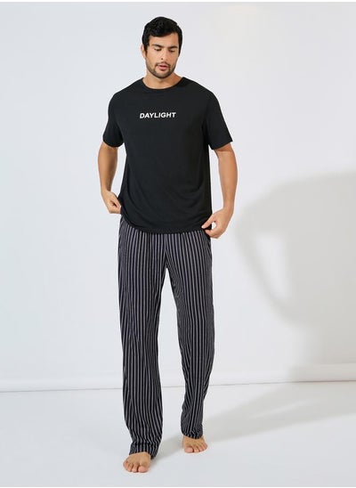 Buy Slogan Print T-Shirt & Striped Pyjama Set in Saudi Arabia