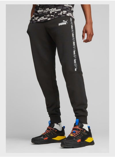 Buy Essential Tape Camo Sweatpants in UAE