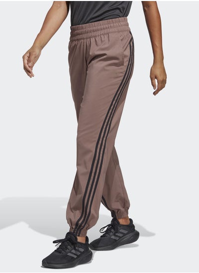 Buy 3 Stripe Train Icon Pants in UAE