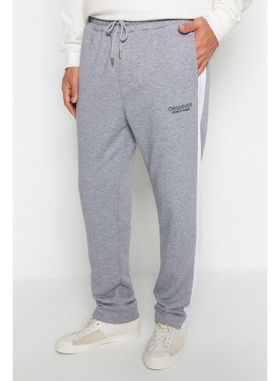 Buy Men's Gray Men's Regular/Regular Cut Contrast Color Paneled Bold Text with Embroidered Regular Leg Sweatpants. in Egypt