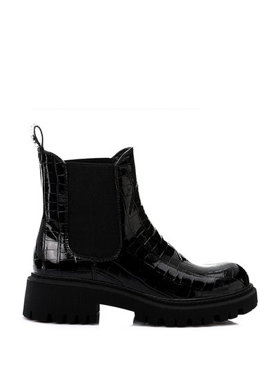 Buy Patterned Leather Slip On Ankle Boots - Black in Egypt