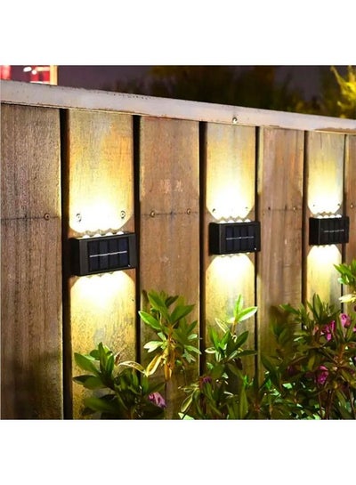 اشتري 8 Pack Solar Wall Lamp Outdoor Waterproof Solar Powered 16 Led Light UP and Down Illuminate Home Garden Porch Yard Decoration Warm في الامارات