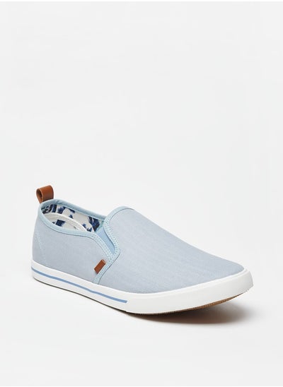 Buy Men's Textured Slip-On Sneakers with Pull Tabs in Saudi Arabia