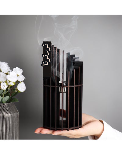 Buy The unique distribution incense burner is black with an Arabic phrase in Saudi Arabia