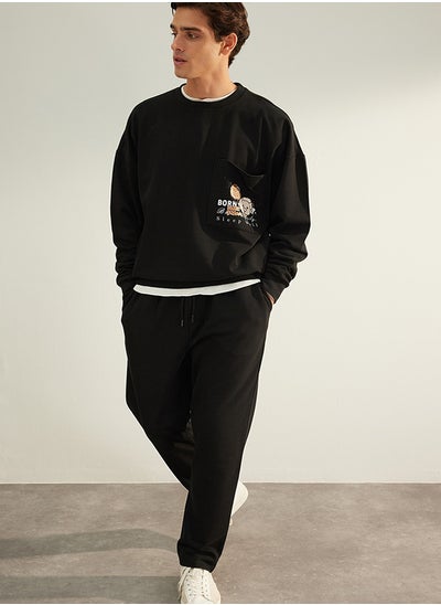 Buy Limited Edition Black Regular Cut Thick Sweatpants TMNAW24EA00023 in Egypt