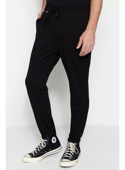 Buy Black Men's Regular/Regular Fit Elastic Leg Sweatpants. in Egypt