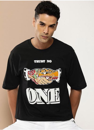 Buy Oversized Trust No One Graphic Print T-Shirt in Saudi Arabia