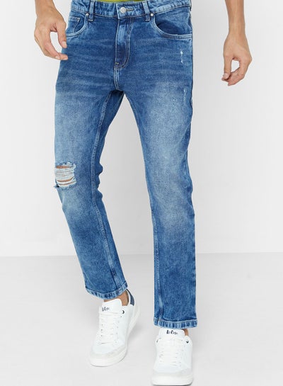 Buy Tapered Cropped Fit Rip Detail Jean in UAE
