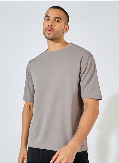 Buy Jacquard Knit Oversized Training T-Shirt in Saudi Arabia