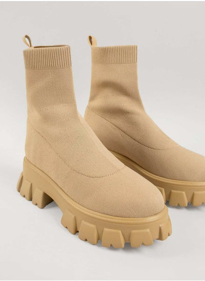 Buy Women's medium boot with a wide sole and a knitted face in UAE