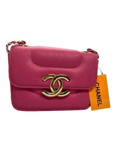 Buy A luxurious women's handbag in fuchsia color with a gold metal handle from Chanel in Egypt