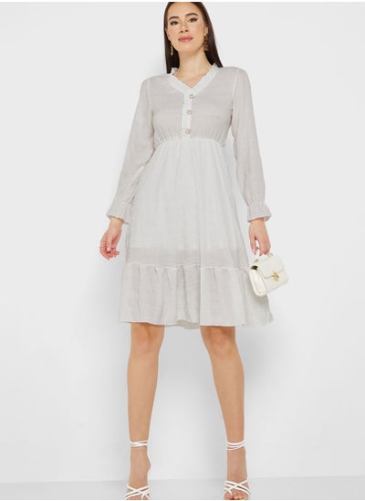 Buy Frill Hem Textured Detail Dress in Saudi Arabia