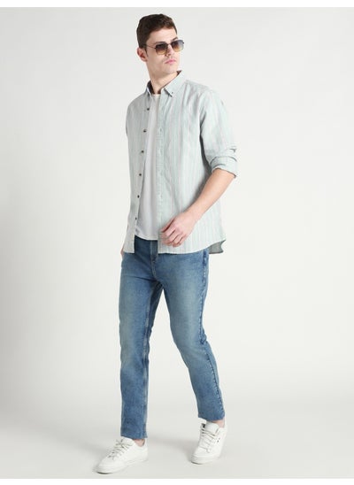 Buy Men's Tapered Fit Light Blue Cotton Jeans - Effortless Style in Saudi Arabia