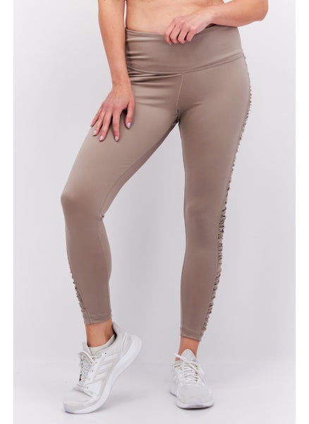 Buy Women Sportswear Fit Training Leggings, Tan in UAE