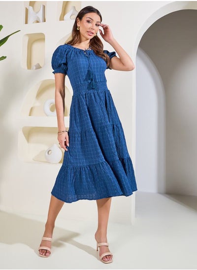 Buy Textured Print Tie Up Neck Tiered Midi Dress in Saudi Arabia