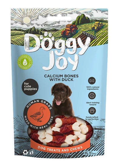 اشتري Doggy Joy Calcium Bones With Duck Puppy Treats 90g في الامارات