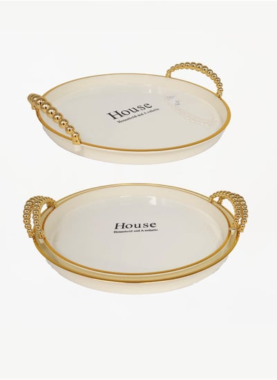 Buy A set of two-piece circular serving trays with an elegant wavy design, sugar/gold in Saudi Arabia