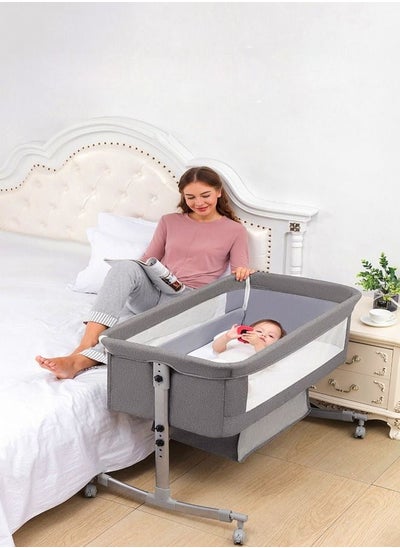 اشتري 4 in 1 Multifunction Height Adjustable Bedside Sleeper with Wheels and Mosquito Nets Large Storage Bag Bassinet for Newborn Infant Baby في الامارات